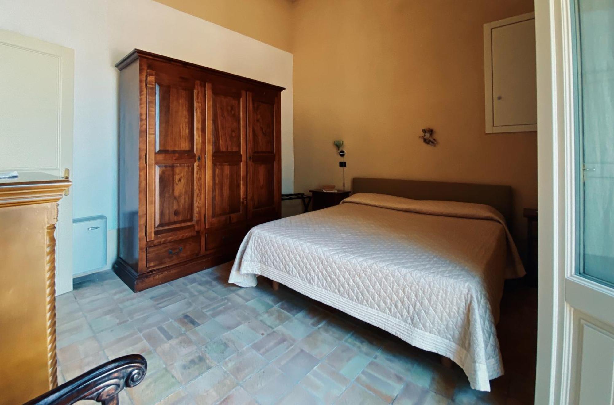 Aparthotel Palazzo Gambuzza Ispica Habitación foto